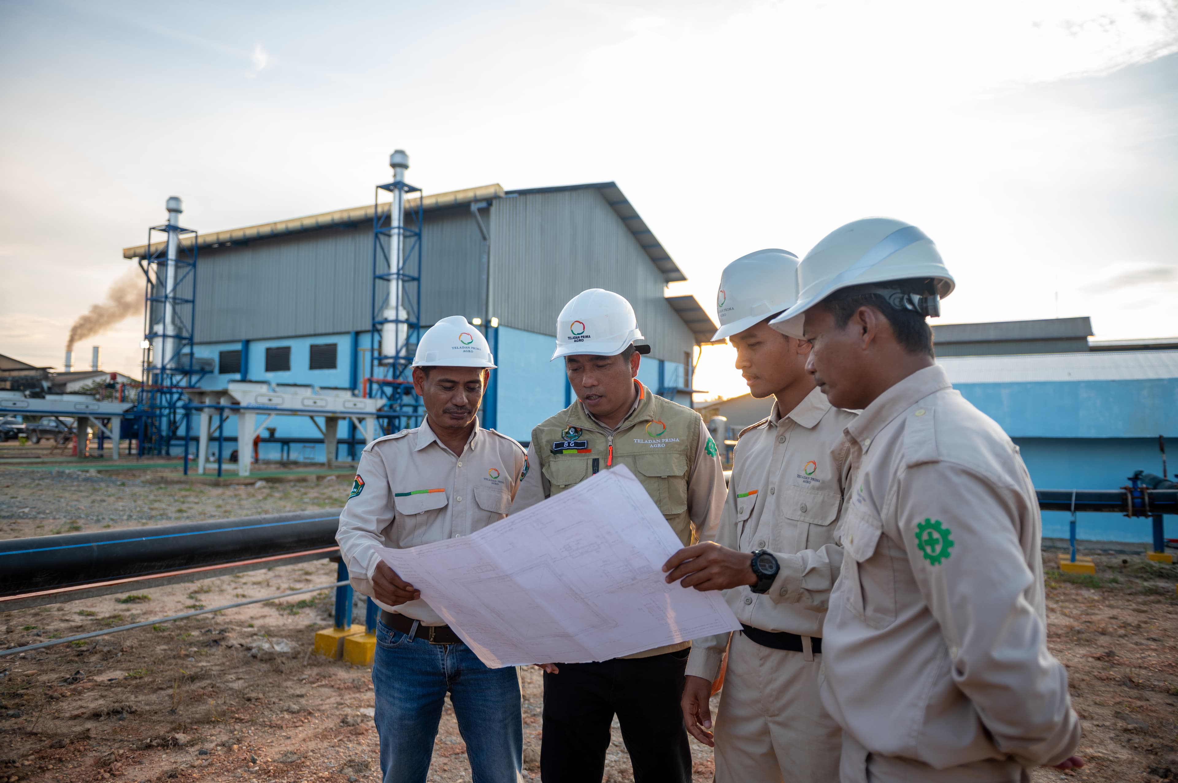 Teladan Prima Agro team discussing operations